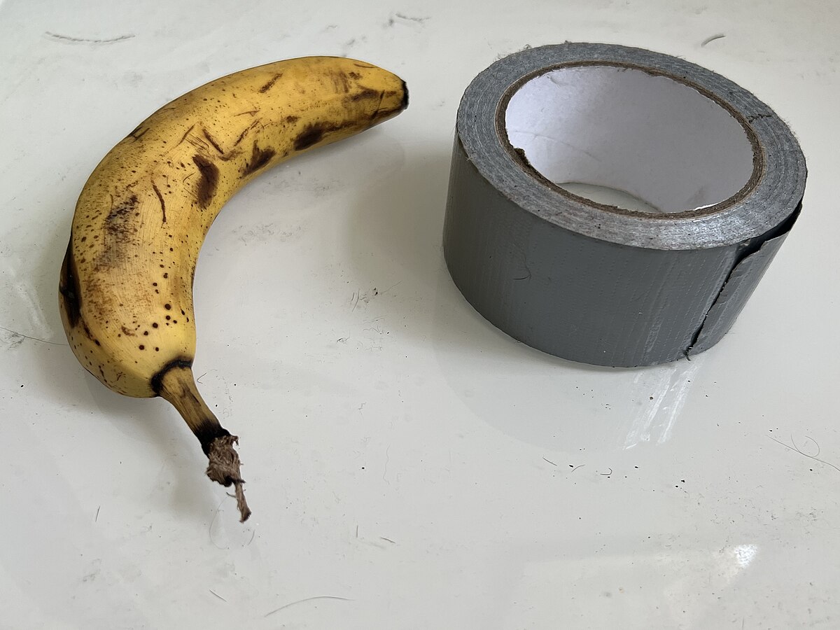 The fruit has been mounted with professional tape and an alarming amount of confidence.
