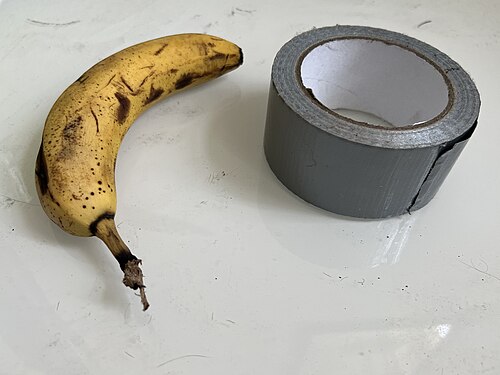 The fruit has been mounted with professional tape and an alarming amount of confidence.